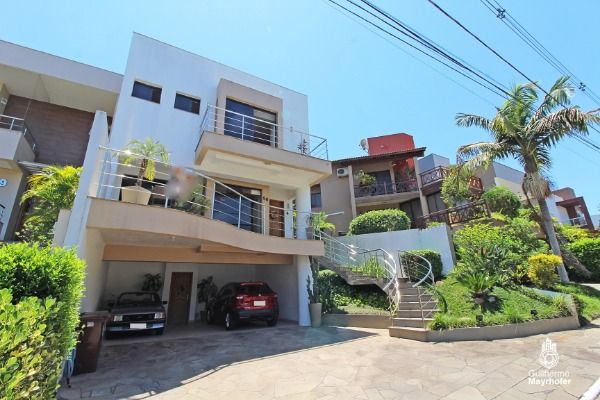 Casa Condominio com 234m², 3 dormitórios, 3 suítes, 2 vagas no bairro Hípica em Porto Alegre para Comprar