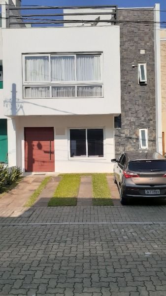 Casa com 187m², 3 dormitórios, 3 suítes, 2 vagas no bairro Lagos De Nova Ipanema em Porto Alegre para Comprar