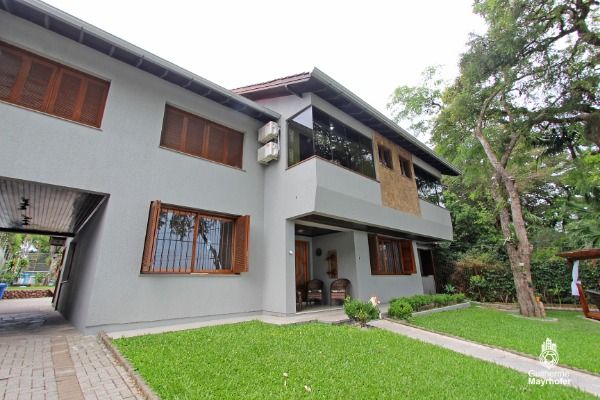 Casa com 629m², 5 dormitórios, 4 suítes, 4 vagas no bairro Ipanema em Porto Alegre para Comprar