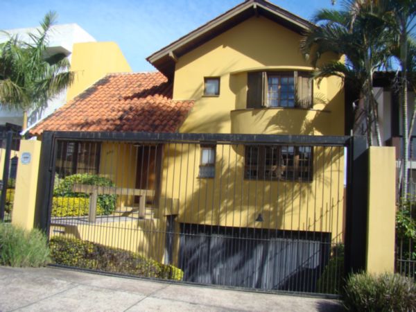 Casa com 365m², 3 dormitórios, 1 suíte, 4 vagas no bairro Jardim Isabel em Porto Alegre para Comprar