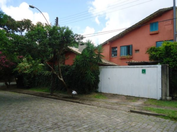 Casa com 252m², 3 dormitórios, 2 vagas no bairro Ipanema em Porto Alegre para Comprar