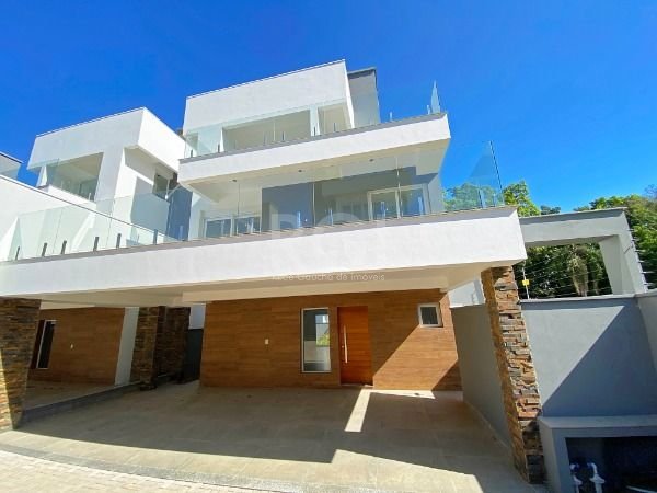 Casa Condominio com 364m², 3 dormitórios, 3 suítes, 2 vagas no bairro Pedra Redonda em Porto Alegre para Comprar