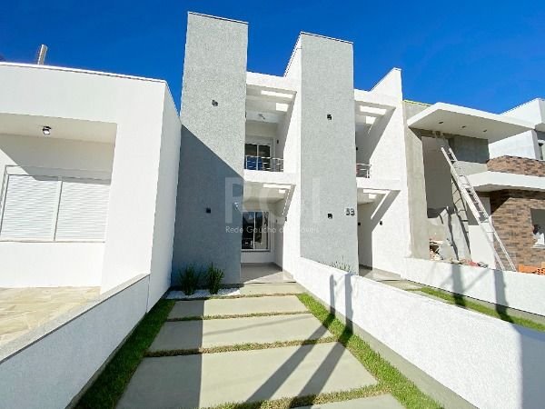 Casa com 88m², 2 dormitórios, 2 suítes, 1 vaga no bairro Hípica em Porto Alegre para Comprar