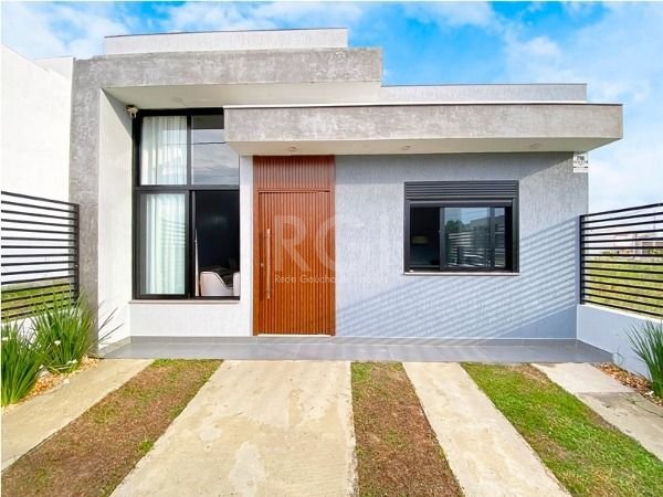 Casa com 109m², 3 dormitórios no bairro Lagos De Nova Ipanema em Porto Alegre para Comprar