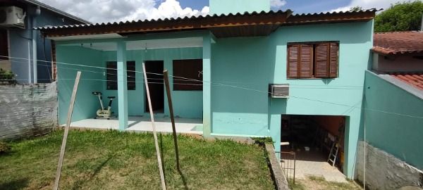 Casa com 60m², 2 dormitórios, 2 vagas no bairro Campo Novo em Porto Alegre para Comprar