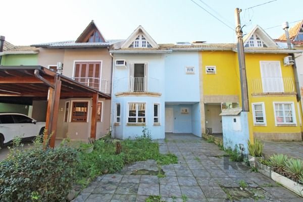 Casa Condominio com 161m², 3 dormitórios, 1 suíte, 2 vagas no bairro Guarujá em Porto Alegre para Comprar