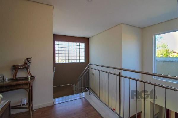 Casa Condominio em Porto Alegre, no bairro Chapéu do Sol, com 4 dormitório(s), à venda.