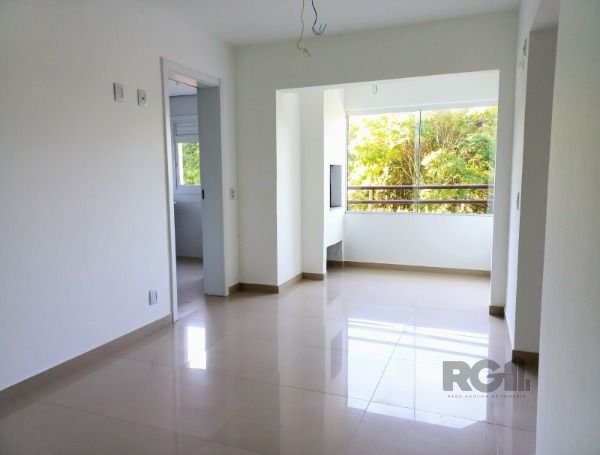 Apartamento com 57m², 2 dormitórios, 1 vaga no bairro Cavalhada em Porto Alegre para Comprar