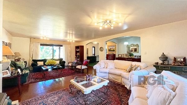 Casa Condominio em Porto Alegre, no bairro Cavalhada, com 4 dormitório(s), e 4 banheiros, à venda.