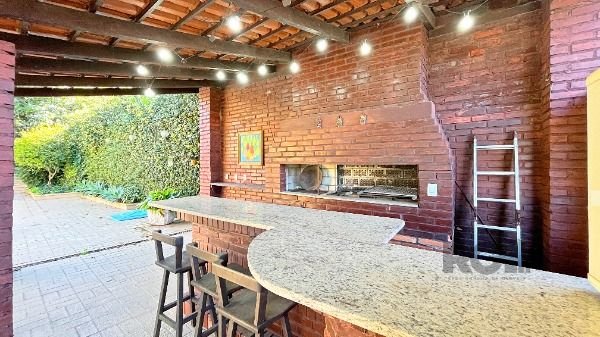 Casa Condominio em Porto Alegre, no bairro Cavalhada, com 4 dormitório(s), e 4 banheiros, à venda.