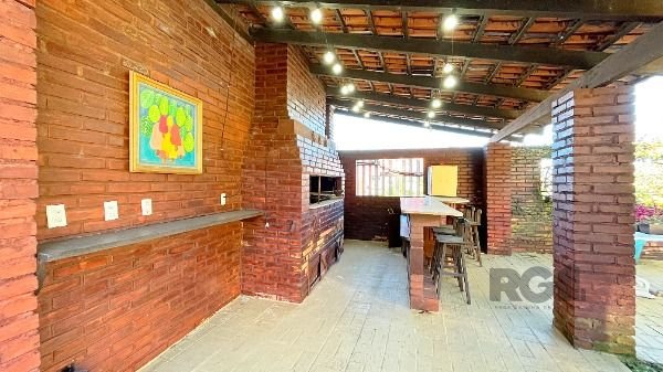 Casa Condominio em Porto Alegre, no bairro Cavalhada, com 4 dormitório(s), e 4 banheiros, à venda.