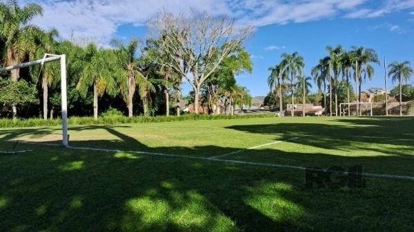 Casa Condominio em Porto Alegre, no bairro Cavalhada, com 4 dormitório(s), e 4 banheiros, à venda.
