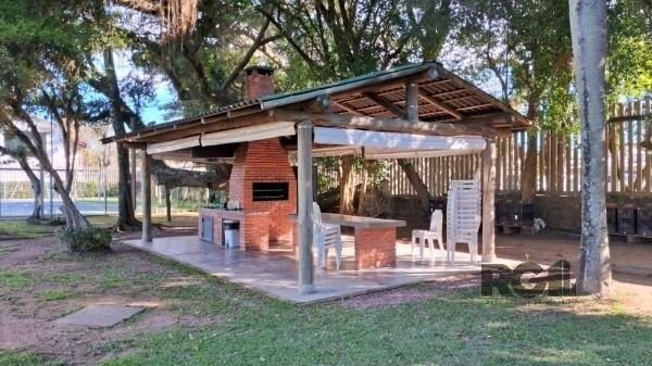 Casa Condominio em Porto Alegre, no bairro Cavalhada, com 4 dormitório(s), e 4 banheiros, à venda.