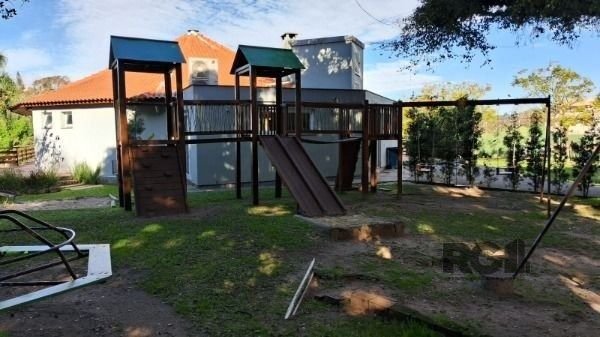 Casa Condominio em Porto Alegre, no bairro Cavalhada, com 4 dormitório(s), e 4 banheiros, à venda.