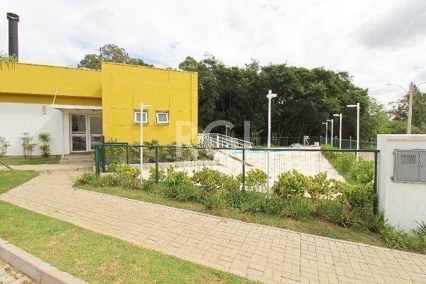 Casa Condominio com 108m², 3 dormitórios, 1 suíte, 2 vagas no bairro Campo Novo em Porto Alegre para Comprar