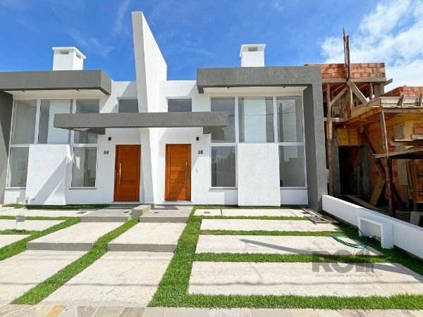 Casa Condominio com 91m², 3 dormitórios, 1 suíte, 2 vagas no bairro Hípica em Porto Alegre para Comprar
