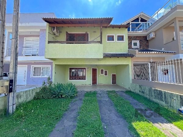 Casa com 151m², 3 dormitórios, 1 suíte, 2 vagas no bairro Lagos De Nova Ipanema em Porto Alegre para Comprar