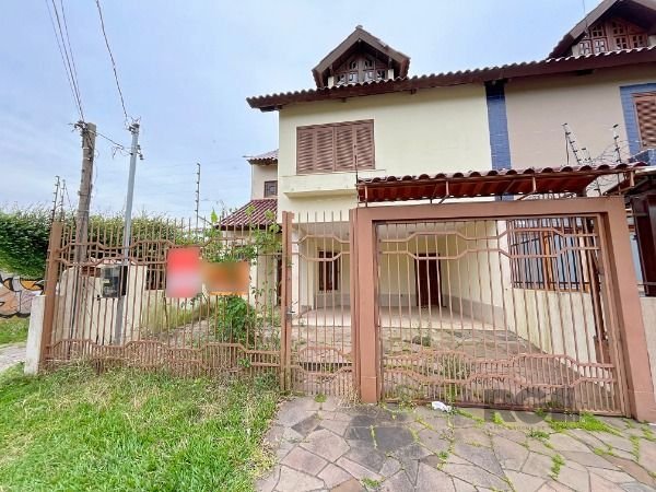 Casa com 172m², 3 dormitórios, 2 suítes, 2 vagas no bairro Ipanema em Porto Alegre para Comprar