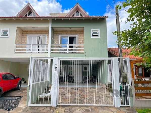 Casa com 149m², 3 dormitórios, 1 suíte, 2 vagas no bairro Jardins Do Prado em Porto Alegre para Comprar