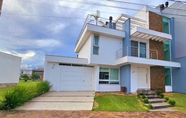 Casa com 248m², 3 dormitórios, 1 suíte, 2 vagas no bairro Hípica em Porto Alegre para Comprar