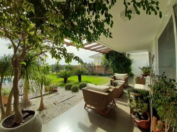 Casa Condominio em Porto Alegre, no bairro Belém Novo, com 3 dormitório(s), e 3 banheiros, à venda.