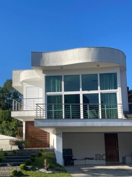 Casa Condominio à venda com 267m², 3 quartos, 3 suítes, 3 vagas no bairro Jardim Carvalho em Porto Alegre
