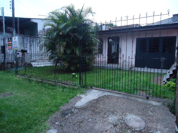 Casa com 100m², 2 dormitórios, 2 vagas no bairro Vila Nova em Porto Alegre para Comprar