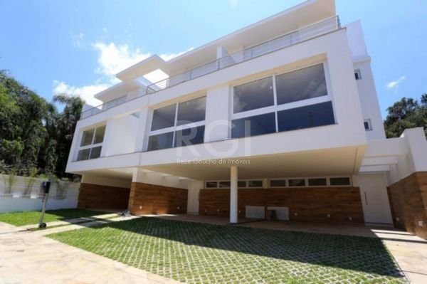 Casa Condominio com 211m², 3 dormitórios, 3 suítes, 2 vagas no bairro Jardim Isabel em Porto Alegre para Comprar