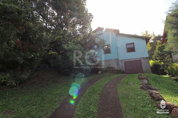 Casa Condominio com 150m², 3 dormitórios, 2 vagas no bairro Vila Nova em Porto Alegre para Comprar