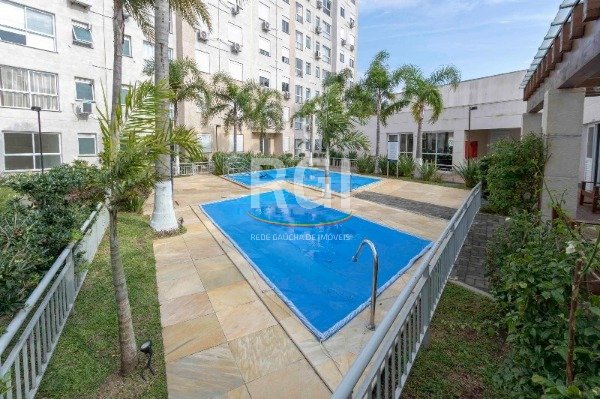 Apartamento com 56m², 2 dormitórios, 1 suíte, 1 vaga no bairro Cavalhada em Porto Alegre para Comprar