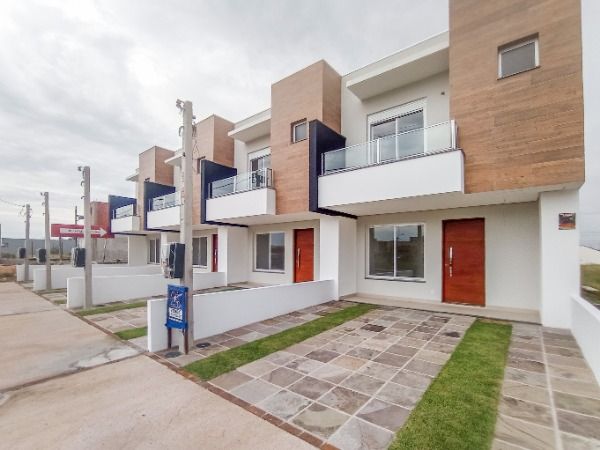 Casa com 125m², 3 dormitórios, 1 suíte, 2 vagas no bairro Hípica em Porto Alegre para Comprar