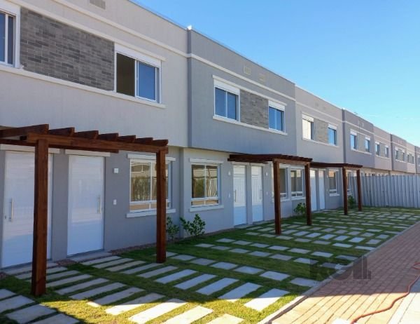 Casa com 58m², 2 dormitórios no bairro Vila Nova em Porto Alegre para Comprar