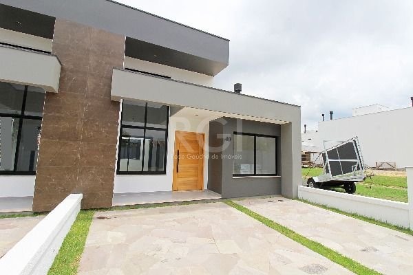 Casa Condominio com 100m², 3 dormitórios, 1 suíte, 2 vagas no bairro Hípica em Porto Alegre para Comprar