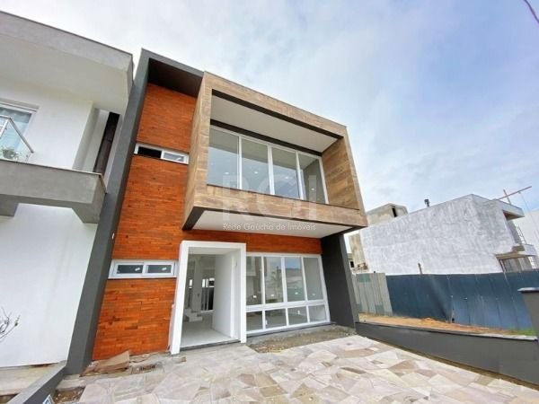 Casa Condominio com 186m², 3 dormitórios, 3 suítes, 2 vagas no bairro Hípica em Porto Alegre para Comprar