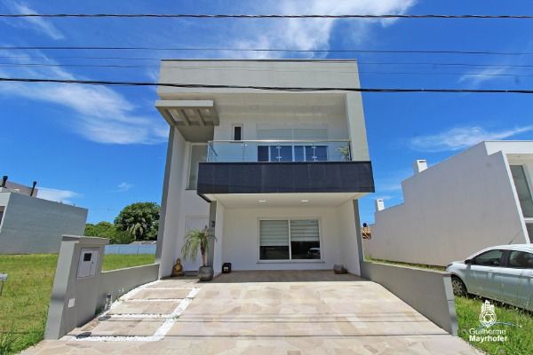 Casa Condominio com 203m², 3 dormitórios, 1 suíte, 2 vagas no bairro Hípica em Porto Alegre para Comprar