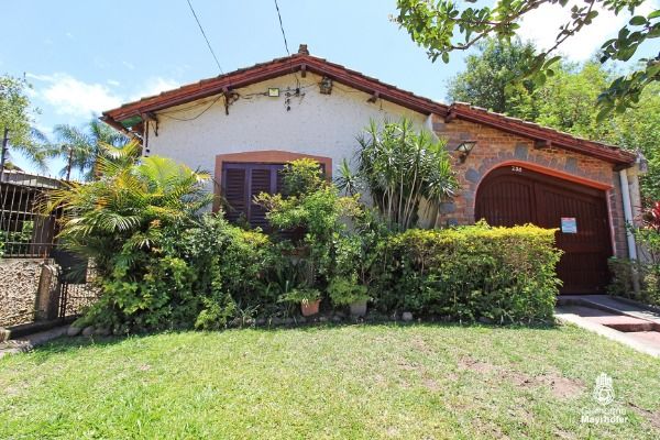 Casa com 180m², 4 dormitórios, 3 vagas no bairro Ipanema em Porto Alegre para Comprar