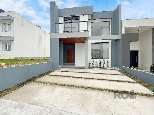 Casa com 152m², 3 dormitórios, 1 suíte, 2 vagas no bairro Lagos De Nova Ipanema em Porto Alegre para Comprar