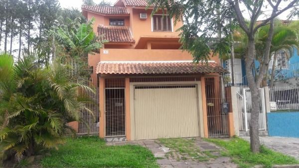 Casa com 144m², 2 dormitórios, 2 vagas no bairro Lomba do Pinheiro em Porto Alegre para Comprar