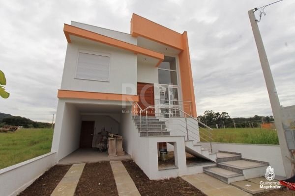 Casa com 196m², 3 dormitórios, 1 suíte, 2 vagas no bairro Lagos De Nova Ipanema em Porto Alegre para Comprar