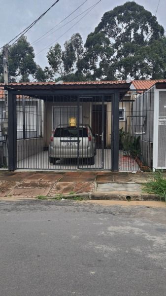 Casa com 40m², 2 dormitórios, 1 suíte, 2 vagas no bairro Restinga em Porto Alegre para Comprar
