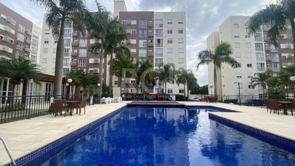 Apartamento com 58m², 2 dormitórios, 1 suíte, 1 vaga no bairro Vila Nova em Porto Alegre para Comprar
