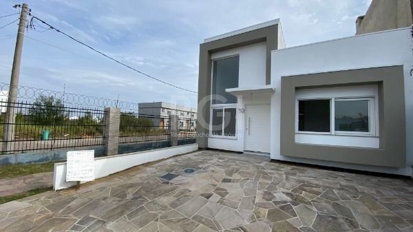 Casa Condominio com 100m², 3 dormitórios, 1 suíte, 2 vagas no bairro Hípica em Porto Alegre para Comprar
