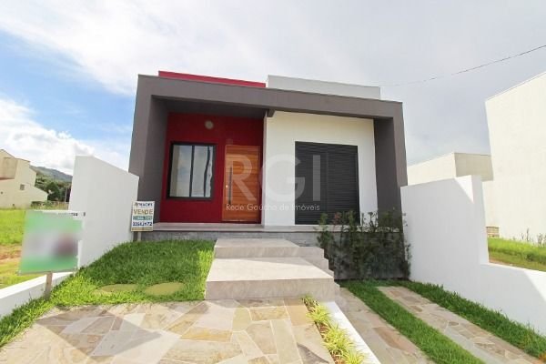 Casa com 100m², 3 dormitórios, 1 suíte, 2 vagas no bairro Lagos De Nova Ipanema em Porto Alegre para Comprar
