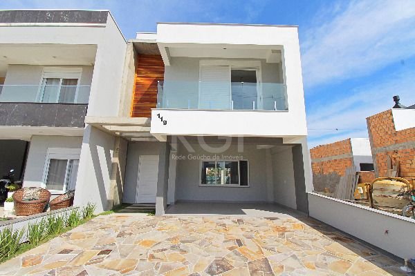 Casa Condominio com 162m², 3 dormitórios, 1 suíte, 2 vagas no bairro Hípica em Porto Alegre para Comprar